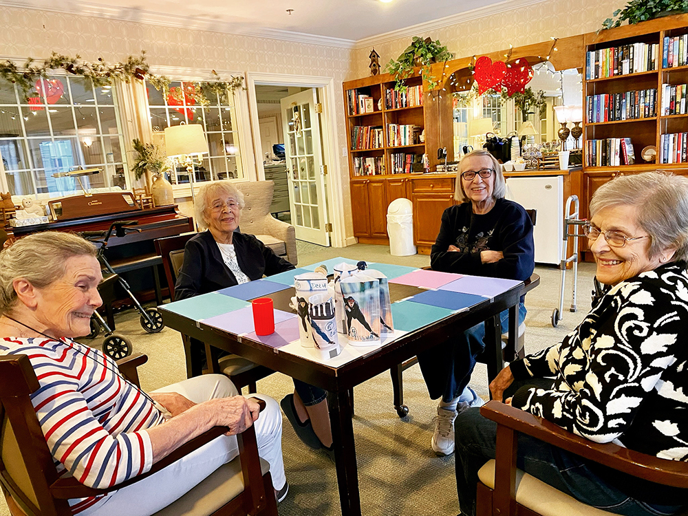 Residents enjoying a social activity in a common area