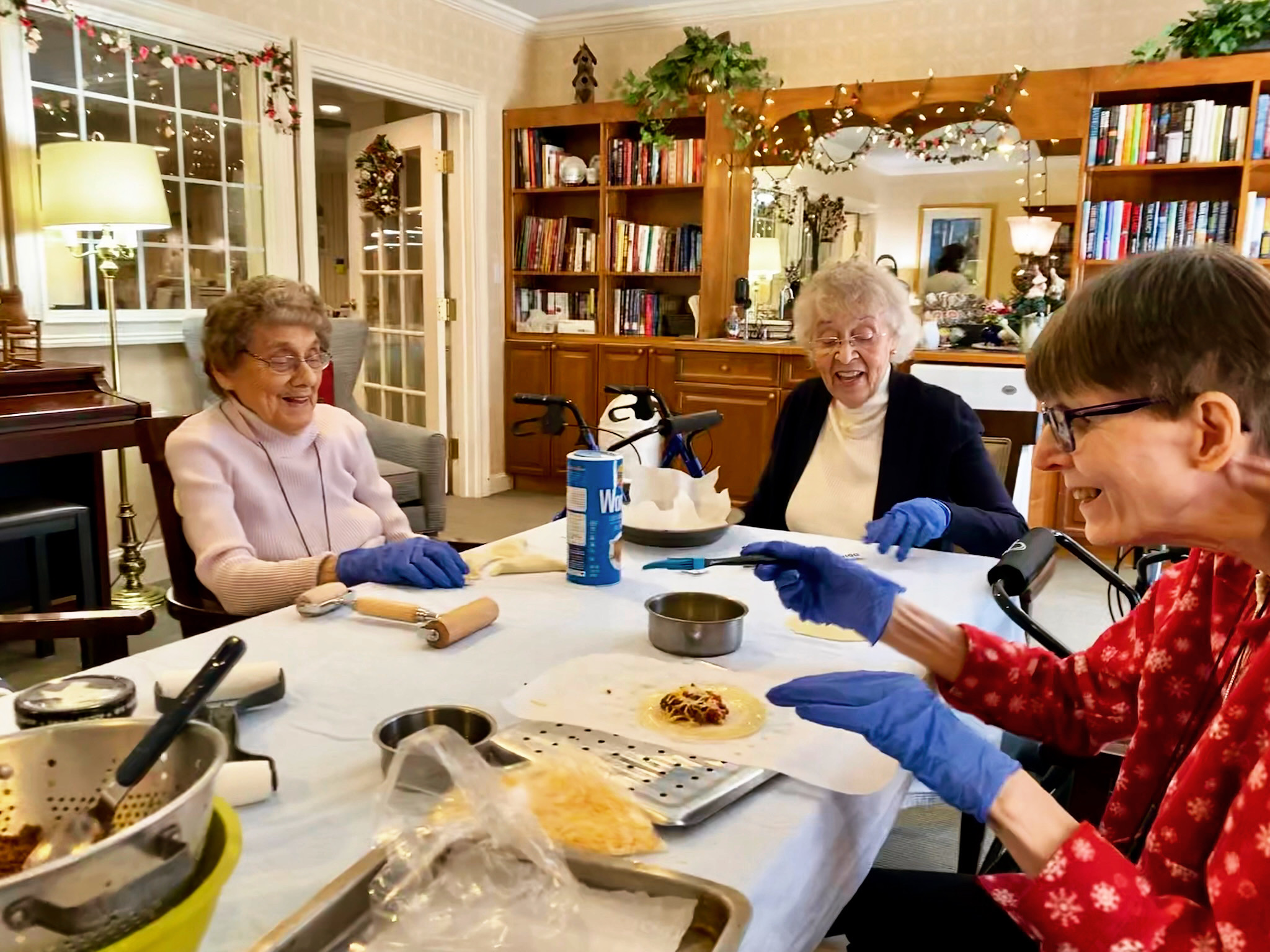 Residents engaged in a cooking activity together