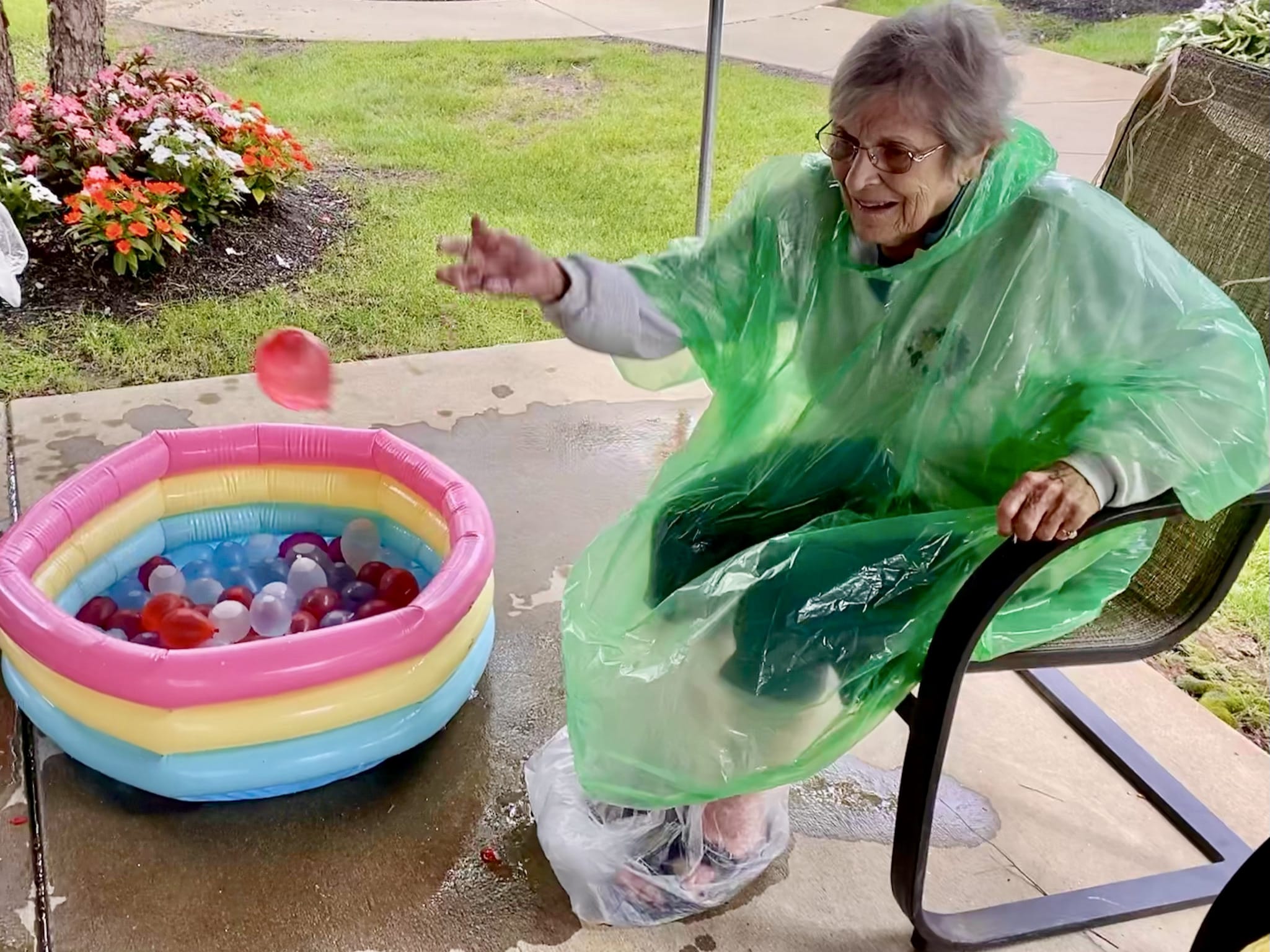 Resident enjoying a ball toss game outdoors