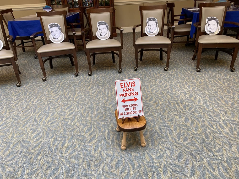 Resident area with Elvis-themed decorations and seating