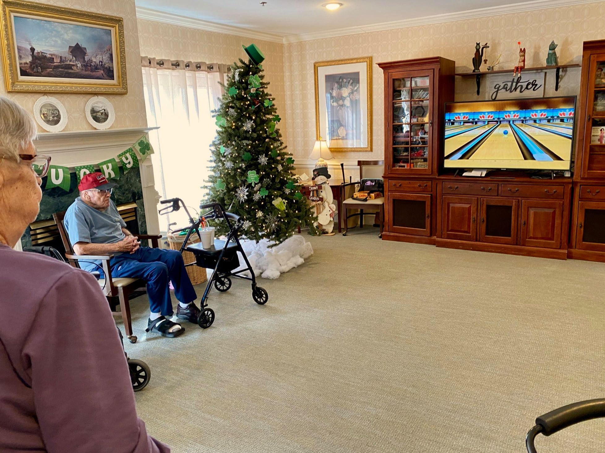 Residents enjoying a bowling game in a common area