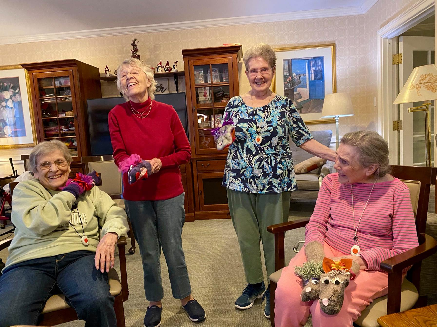 Residents enjoying a cheerful moment in a common area
