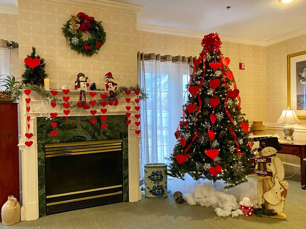 Festively decorated lounge area with a Christmas tree