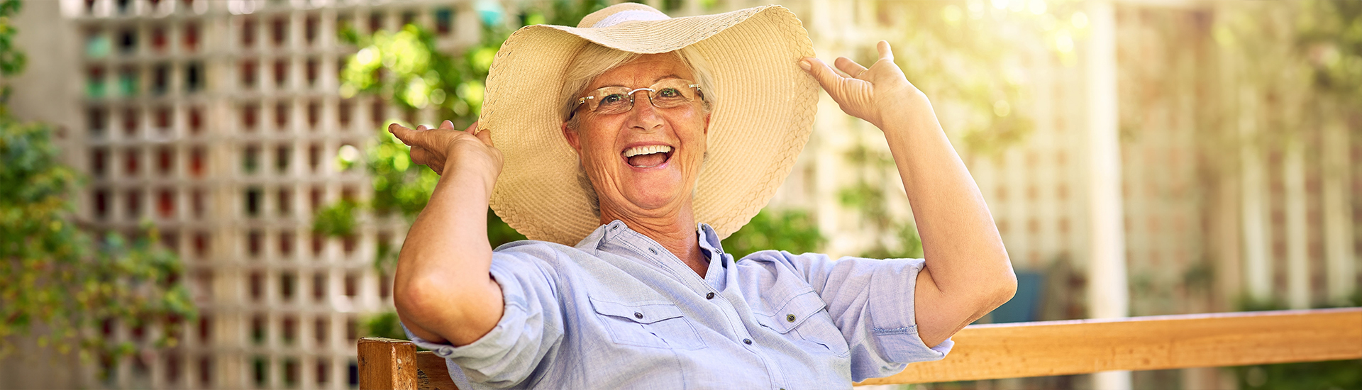 Resident enjoying the outdoors with a wide-brimmed hat