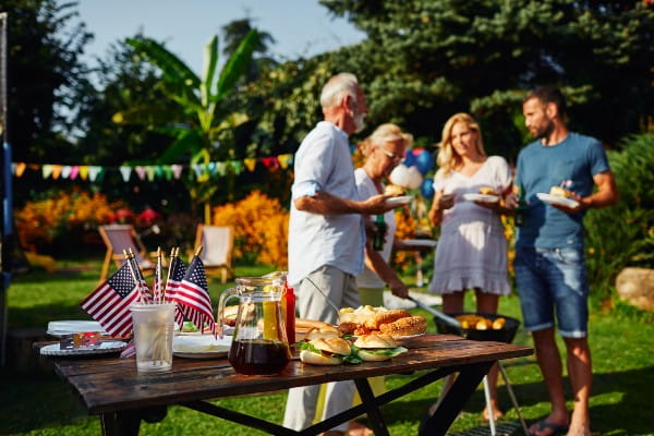 Residents enjoying a summer barbecue in the garden