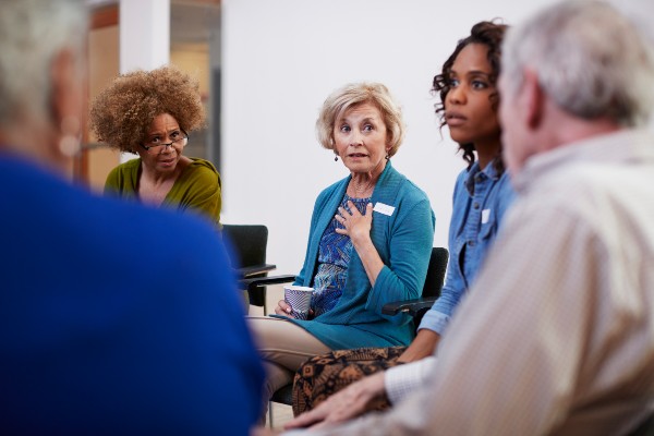 Residents engaged in a discussion group