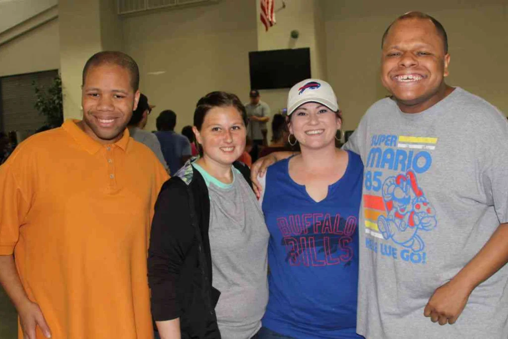 Group of smiling individuals at a social event