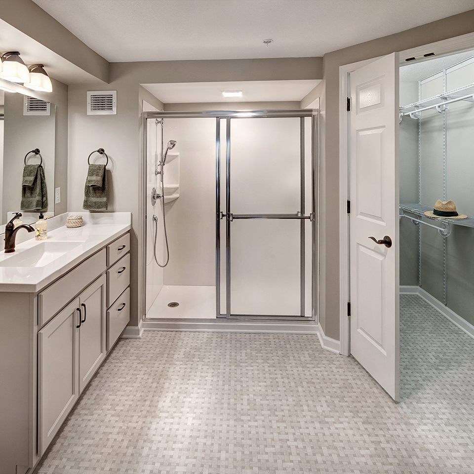Interior view of a private bathroom in a resident suite