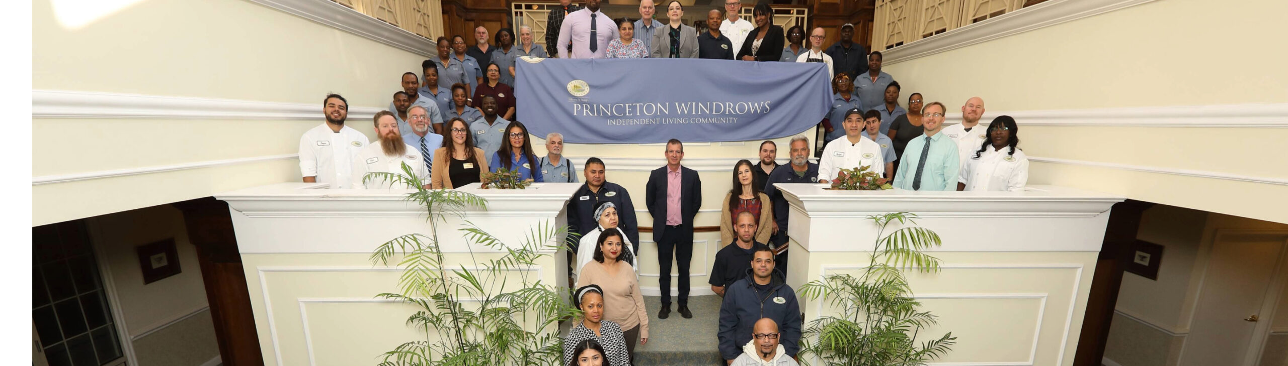 Group photo of staff and residents at Princeton Windrows