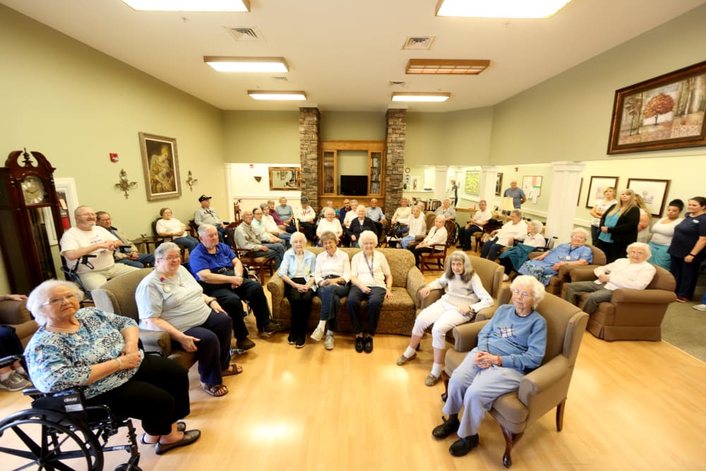Residents gathering in a bright common area