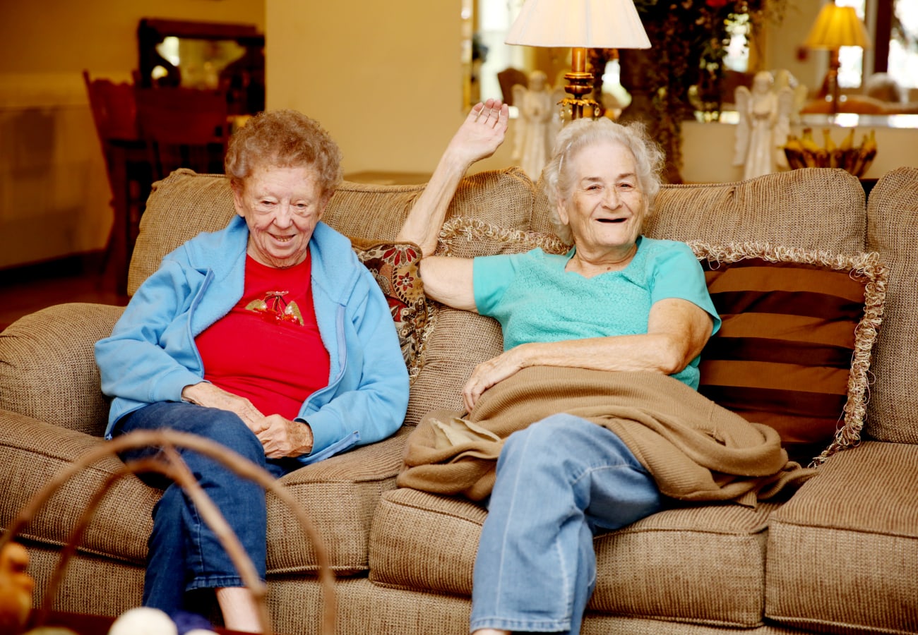 Two residents relaxing in a common area