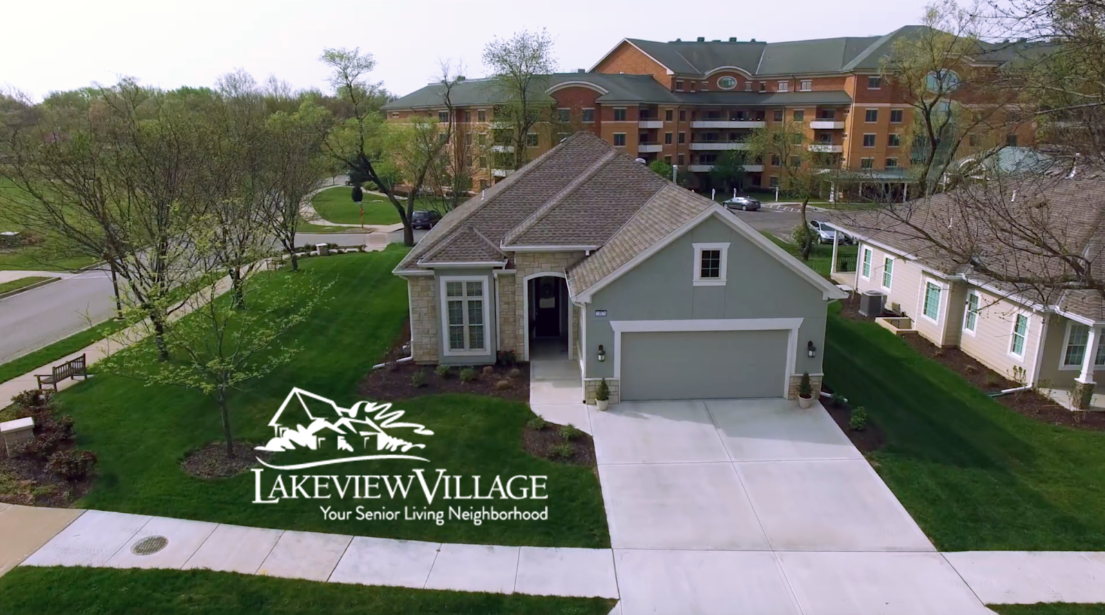 Aerial view of Lakeview Village facility with logo