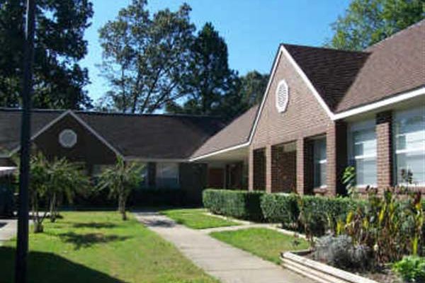 Exterior view of the Pathfinder Inc. Bamburg Complex with landscaped areas