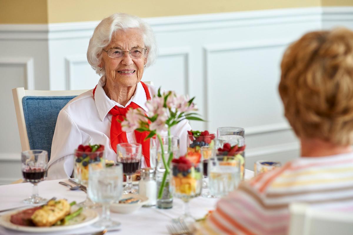 Residents enjoying a meal in the dining room