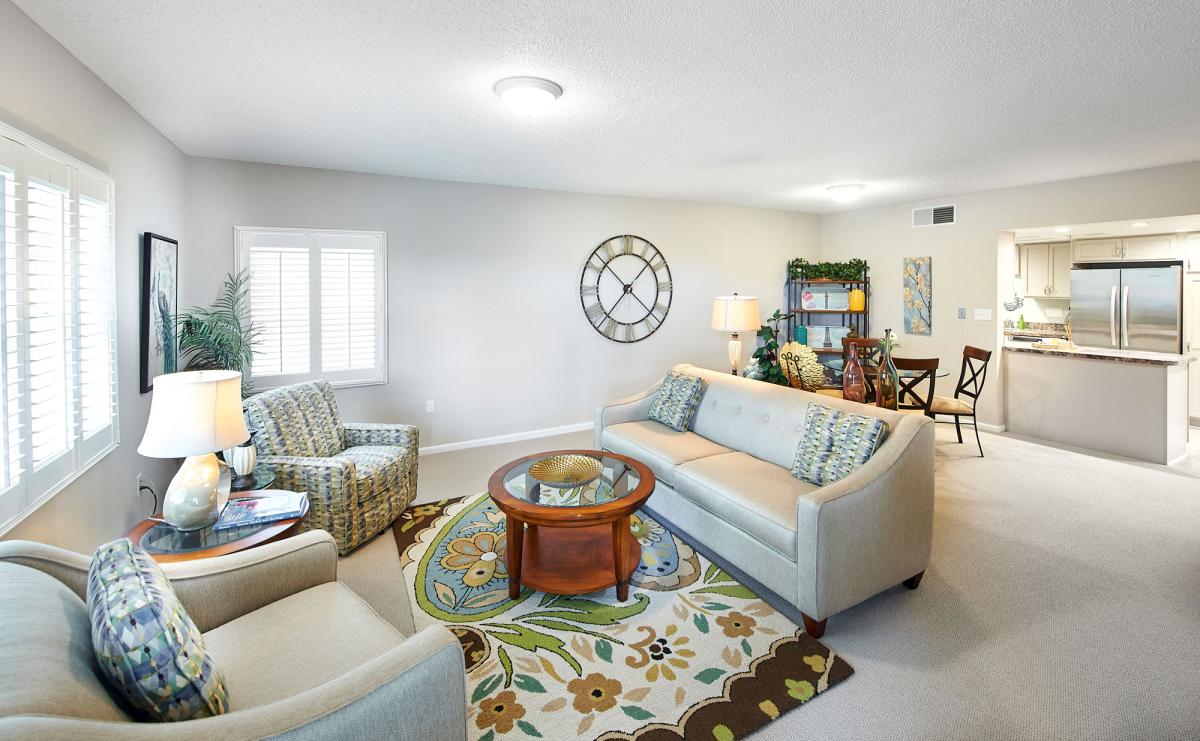 Bright common area with comfortable seating and decor