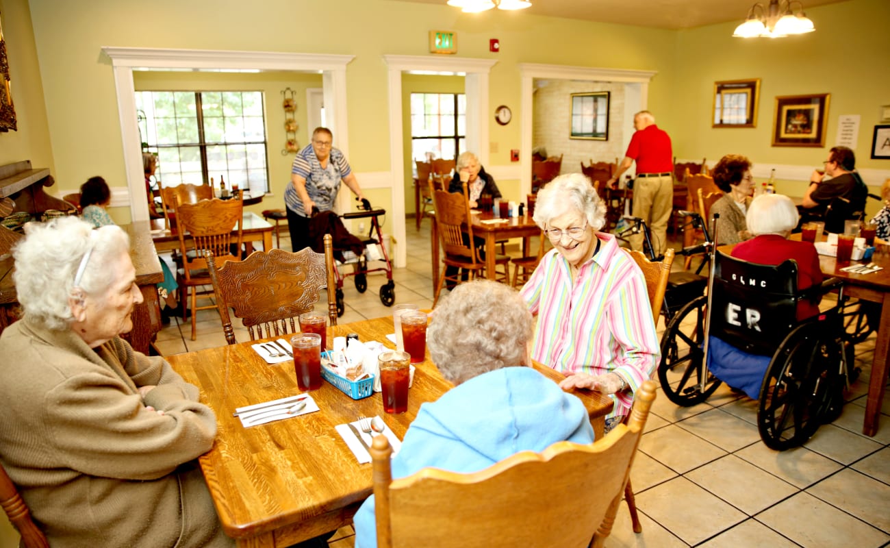 Residents dining and socializing in a common area