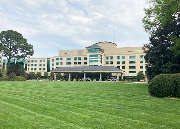 Exterior view of Warwick Forest building and lawn