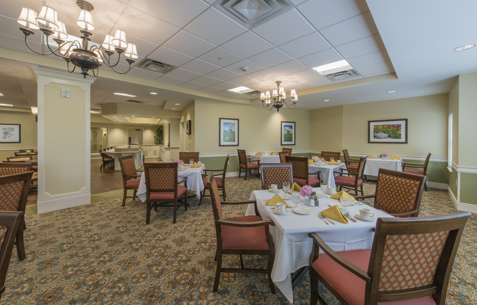 Dining area with tables set for a meal