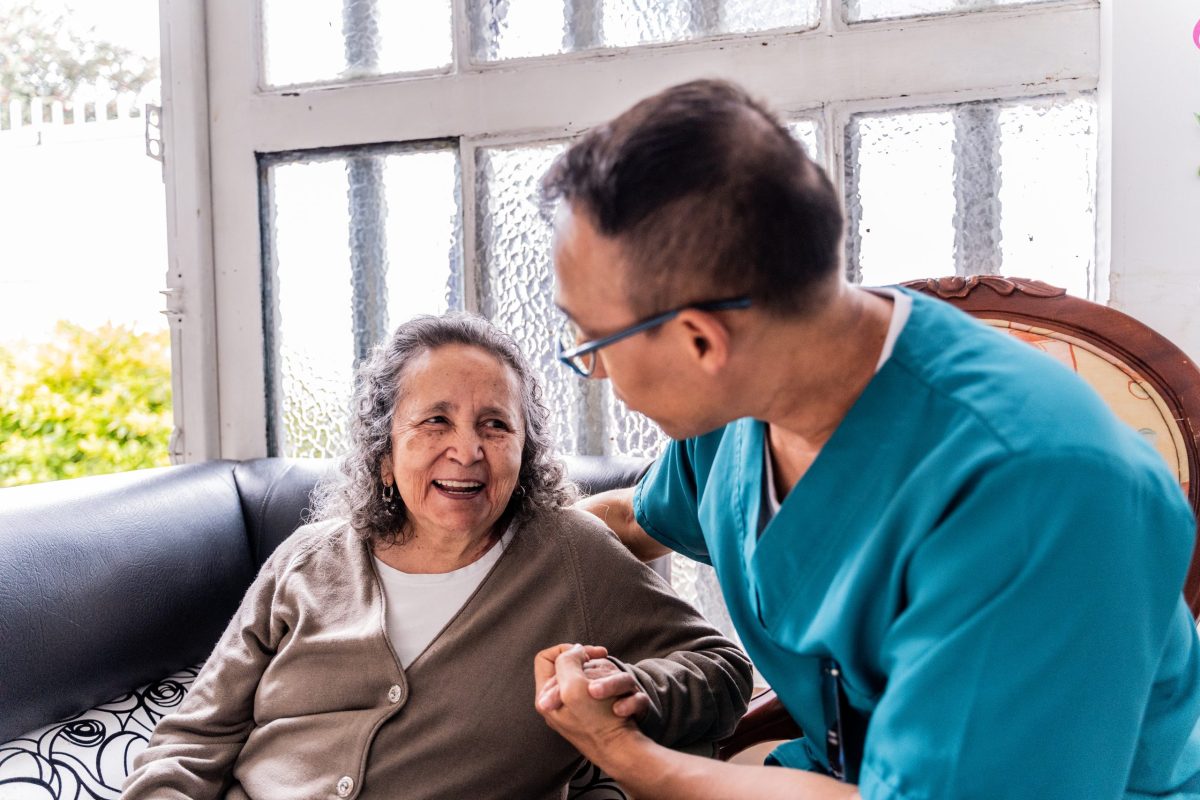 Patient and caregiver engaged in conversation