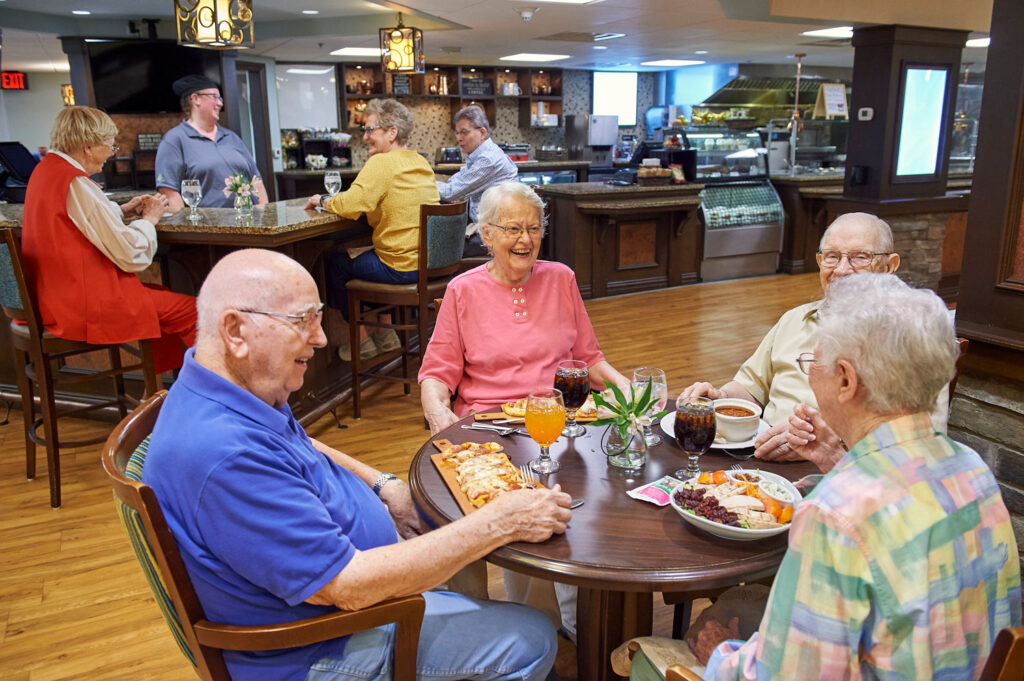 Residents enjoying a meal in the dining area