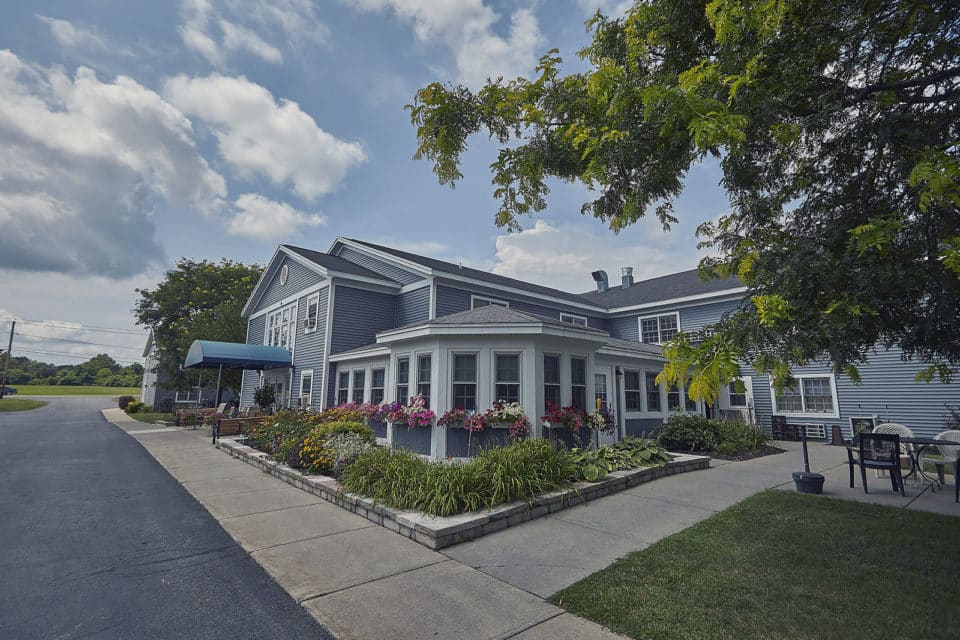Exterior view of the Loretto Community Residences with gardens