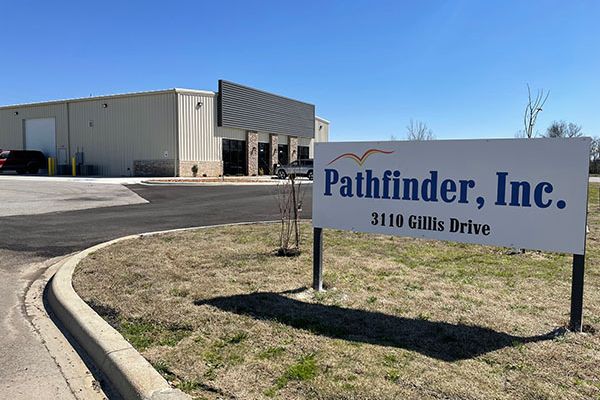 Exterior view of Pathfinder, Inc. building with signage