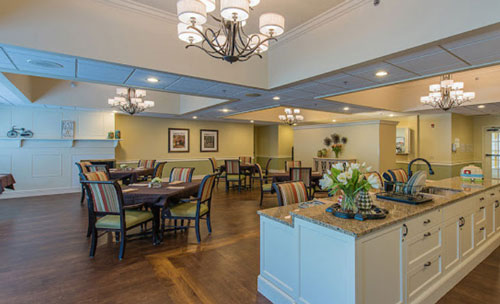 Bright dining area with tables and chairs