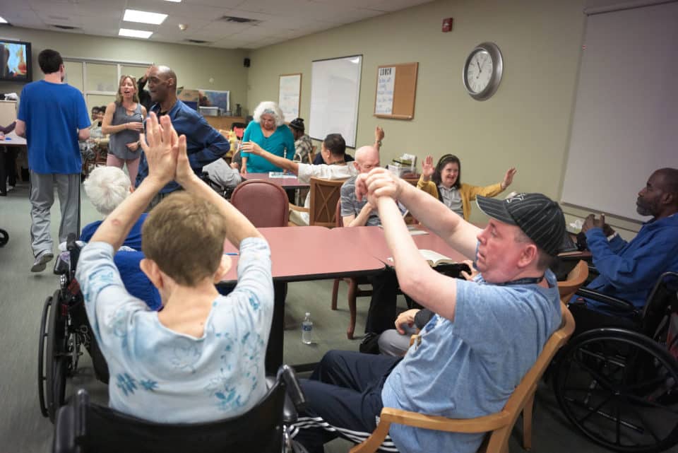 Residents participating in a lively group activity