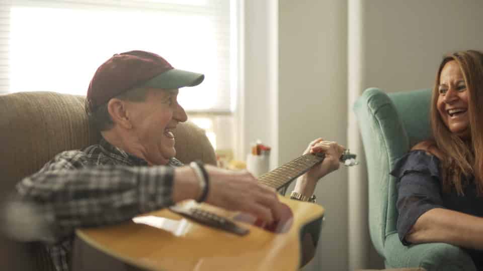 Residents enjoying a musical activity together