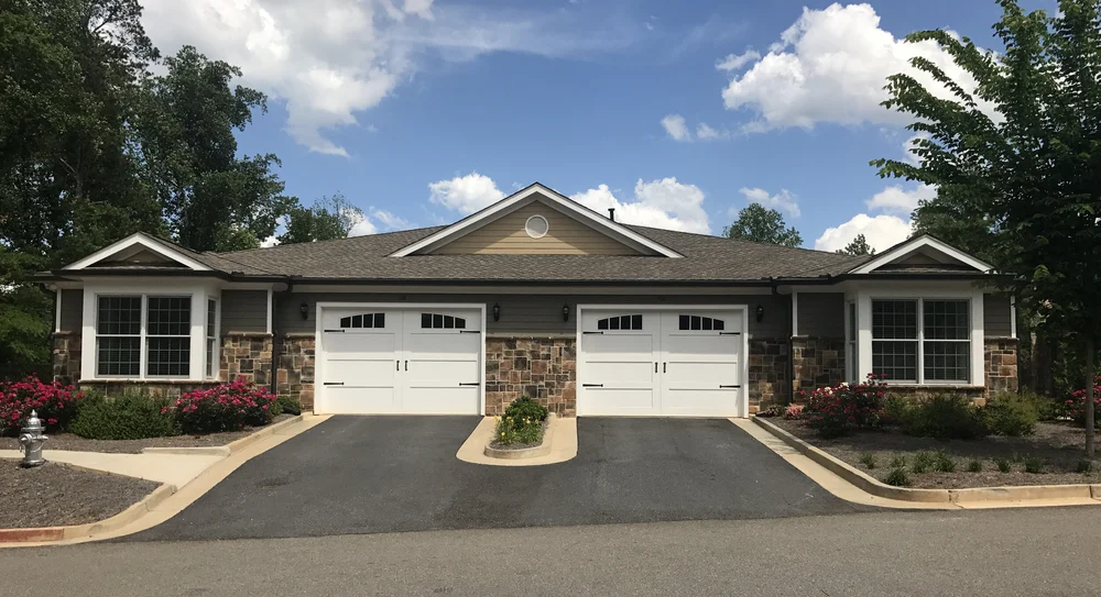 Exterior view of a facility building with garages