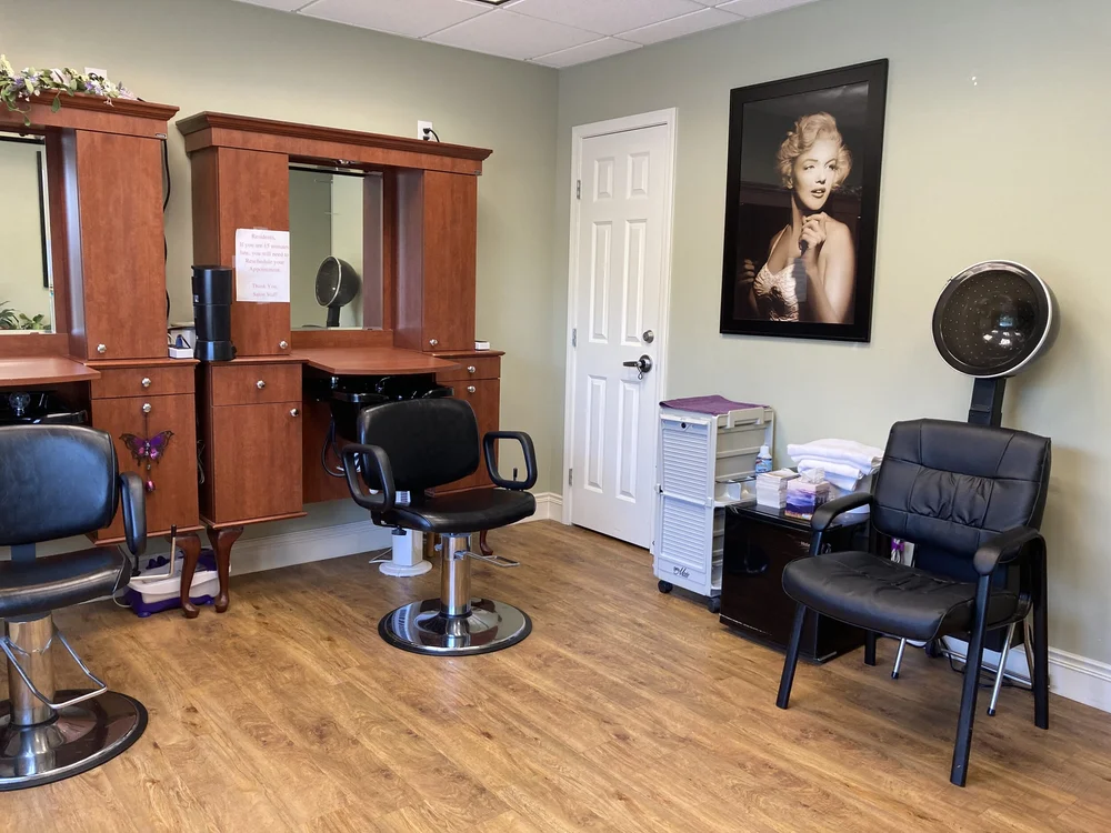 Interior of a salon with styling chairs and equipment