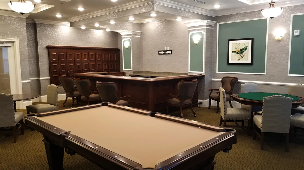 Interior view of a common area with a pool table