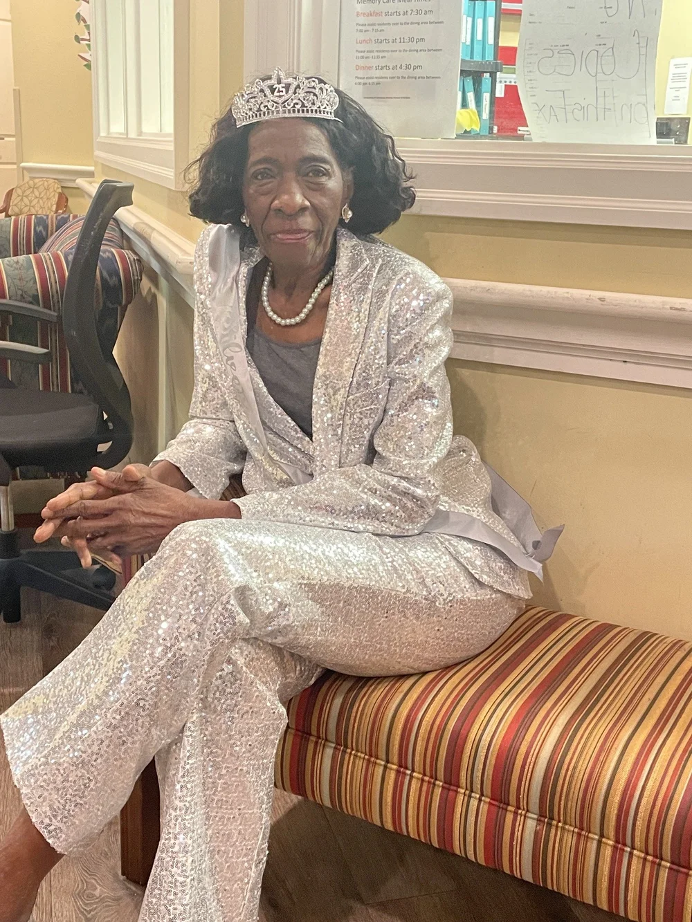 Resident dressed elegantly in a common area