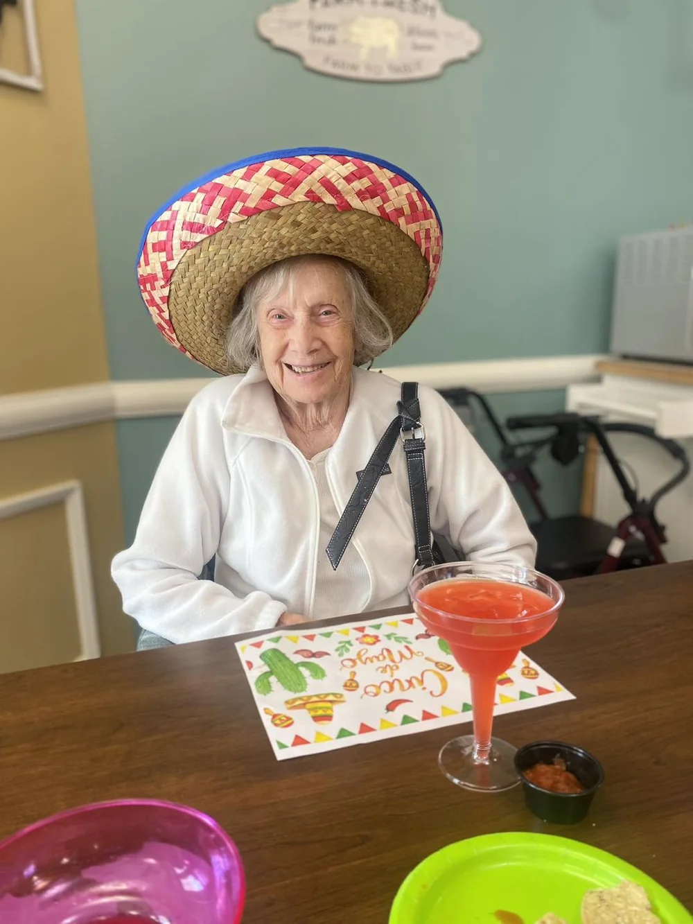 Resident enjoying a festive activity at the facility