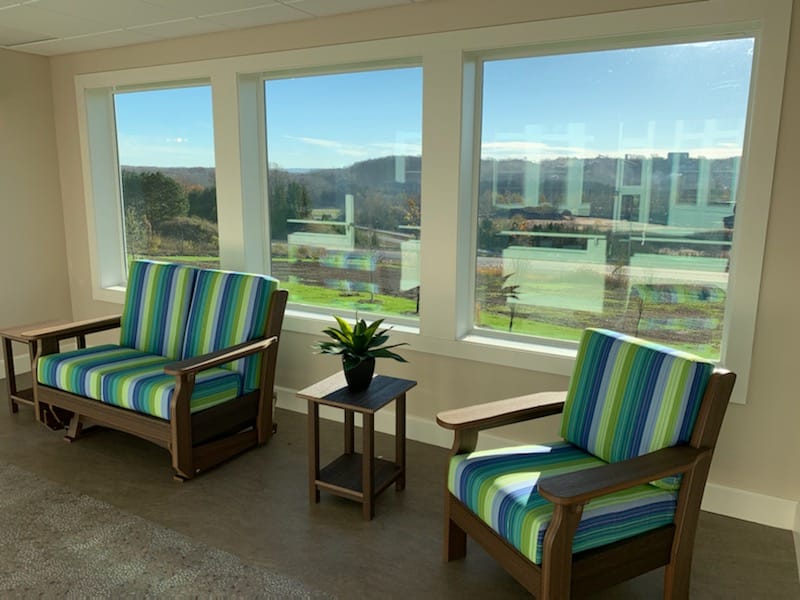 Bright interior common area with striped furniture