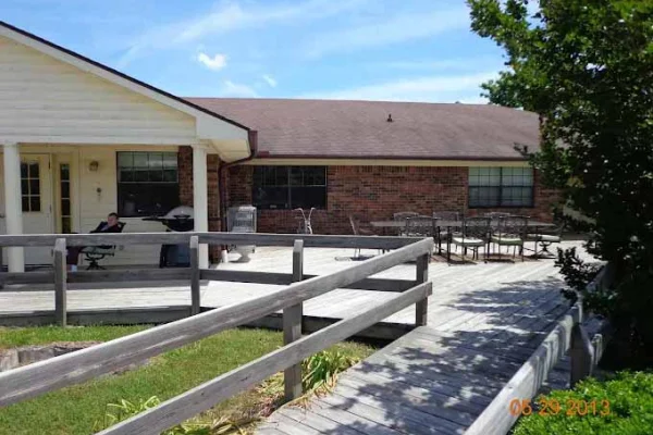 Cedar deck and building exterior of the facility