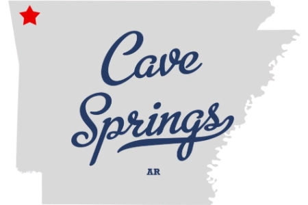 Cave Springs logo with a star and script font