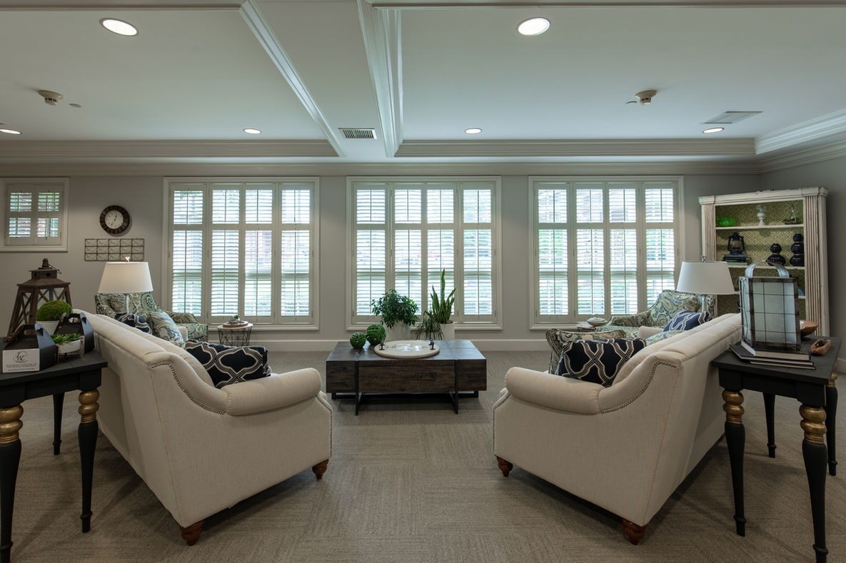Cozy lounge area with comfortable seating and natural light