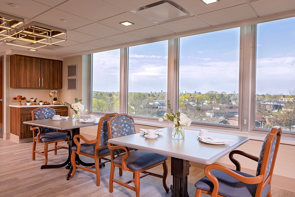 Bright dining area with tables and view