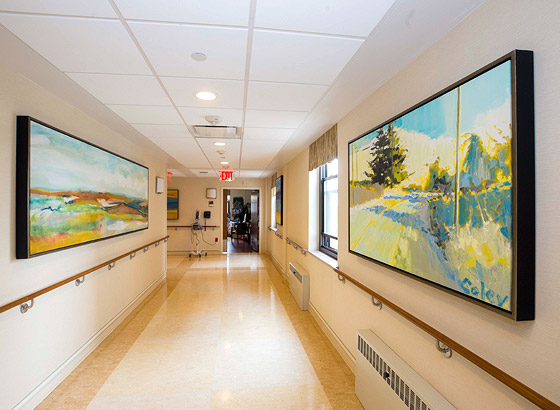 Art-adorned corridor in assisted living facility