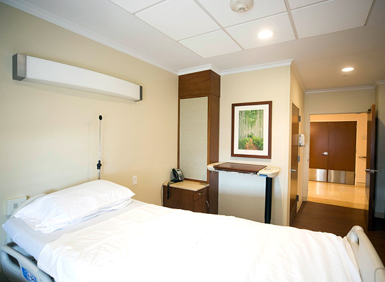 Private resident room with a hospital bed