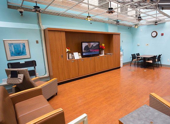 Interior common area with seating and TV