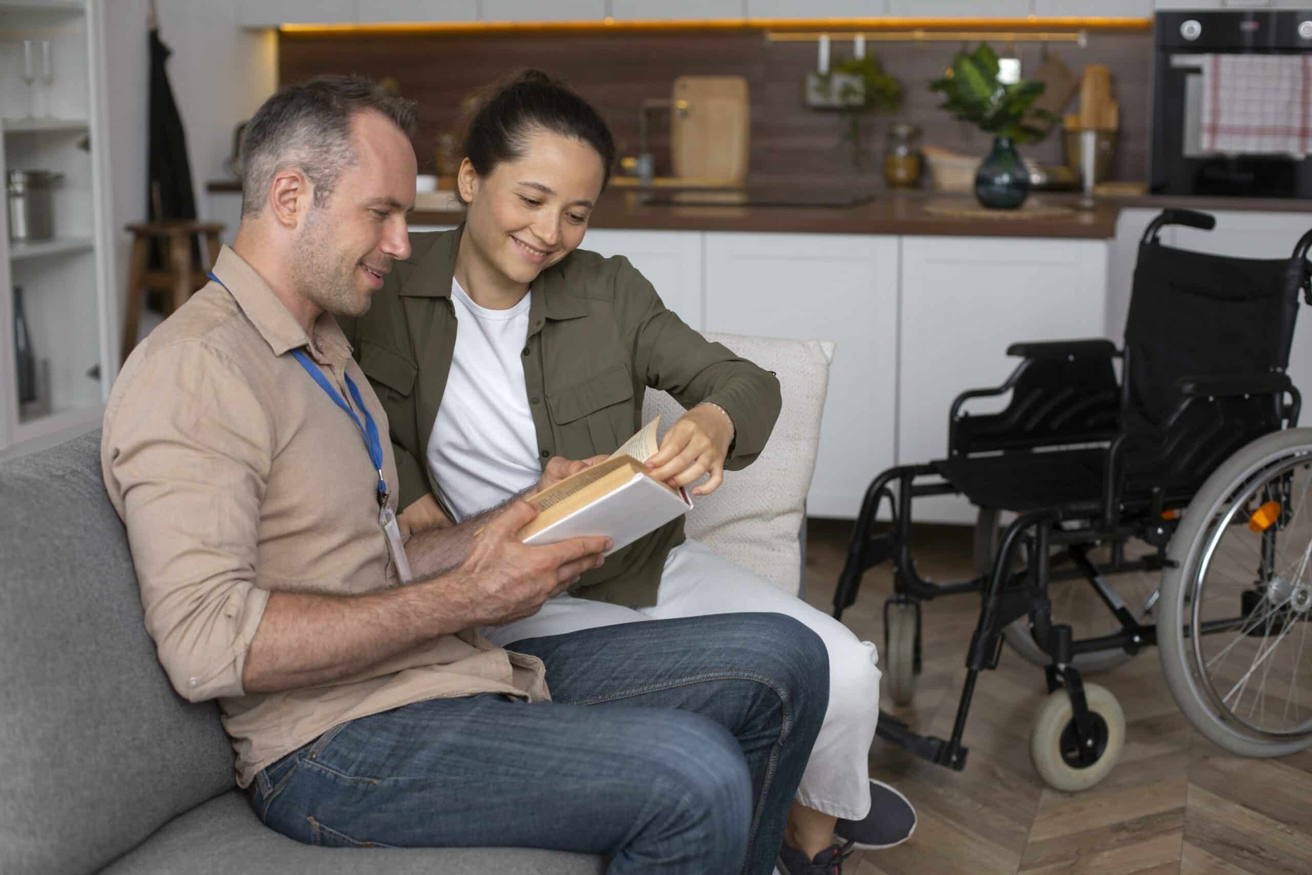 Caregiver and resident engaging with a book