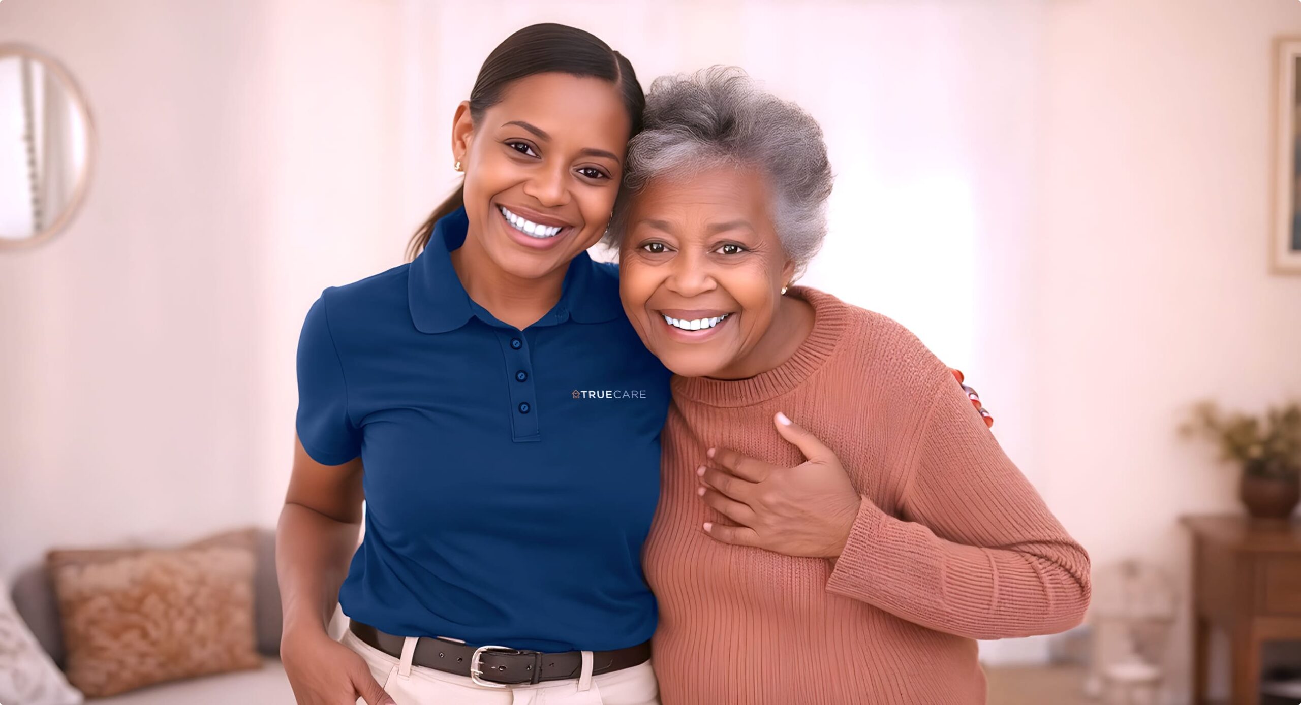 Caregiver with a resident smiling together.