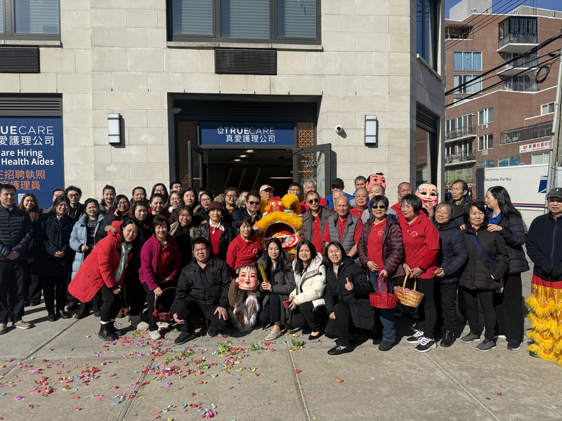 Group of people celebrating outside the facility