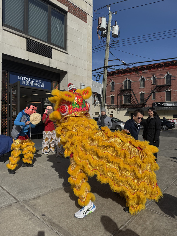 Lion dance performance in front of True Care Home Care