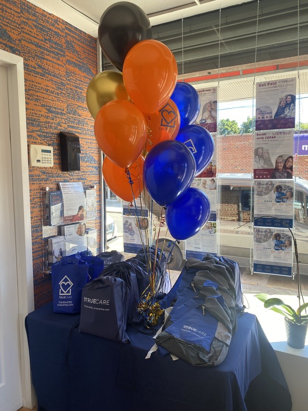 Balloons and promotional items on a table