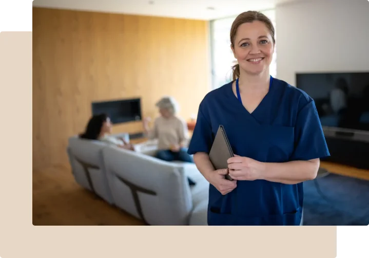 Staff member smiling in a common area