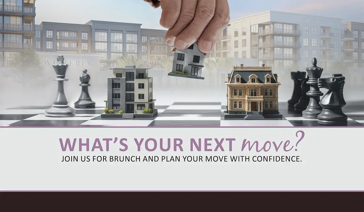 A hand moving game pieces on a chessboard.