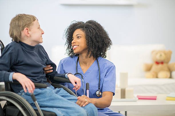 A caregiver and resident sharing a smile.